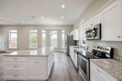 This spacious and stately 3 bedroom 2.5 bath townhome offers the on Panama Country Club in Florida - for sale on GolfHomes.com, golf home, golf lot