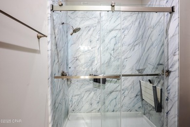 This spacious and stately 3 bedroom 2.5 bath townhome offers the on Panama Country Club in Florida - for sale on GolfHomes.com, golf home, golf lot