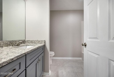 This spacious and stately 3 bedroom 2.5 bath townhome offers the on Panama Country Club in Florida - for sale on GolfHomes.com, golf home, golf lot