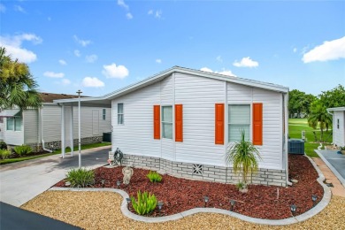 Step inside and feel at home instantly in this beautifully on Lily Lake Golf and RV Resort in Florida - for sale on GolfHomes.com, golf home, golf lot