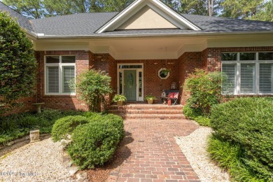 Experience elegant living in this stunning golf front home on Pinewild Country Club of Pinehurst in North Carolina - for sale on GolfHomes.com, golf home, golf lot