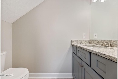 This spacious and stately 3 bedroom 2.5 bath townhome offers the on Panama Country Club in Florida - for sale on GolfHomes.com, golf home, golf lot