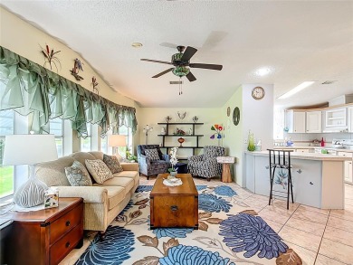 Step inside and feel at home instantly in this beautifully on Lily Lake Golf and RV Resort in Florida - for sale on GolfHomes.com, golf home, golf lot