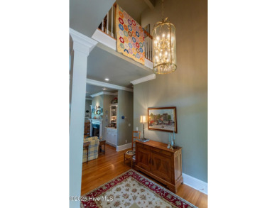Experience elegant living in this stunning golf front home on Pinewild Country Club of Pinehurst in North Carolina - for sale on GolfHomes.com, golf home, golf lot
