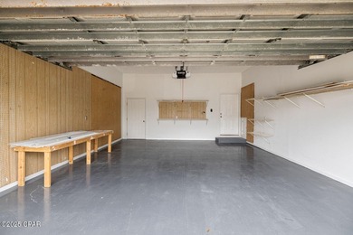 This spacious and stately 3 bedroom 2.5 bath townhome offers the on Panama Country Club in Florida - for sale on GolfHomes.com, golf home, golf lot