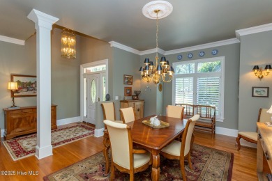 Experience elegant living in this stunning golf front home on Pinewild Country Club of Pinehurst in North Carolina - for sale on GolfHomes.com, golf home, golf lot