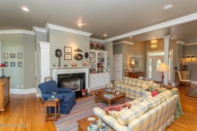 Experience elegant living in this stunning golf front home on Pinewild Country Club of Pinehurst in North Carolina - for sale on GolfHomes.com, golf home, golf lot