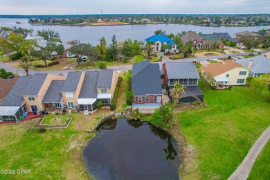This spacious and stately 3 bedroom 2.5 bath townhome offers the on Panama Country Club in Florida - for sale on GolfHomes.com, golf home, golf lot