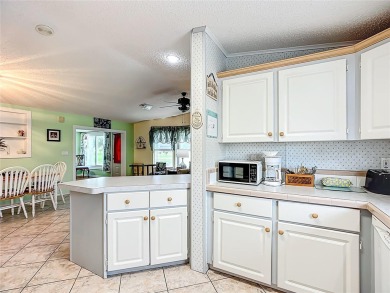 Step inside and feel at home instantly in this beautifully on Lily Lake Golf and RV Resort in Florida - for sale on GolfHomes.com, golf home, golf lot