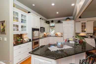Experience elegant living in this stunning golf front home on Pinewild Country Club of Pinehurst in North Carolina - for sale on GolfHomes.com, golf home, golf lot
