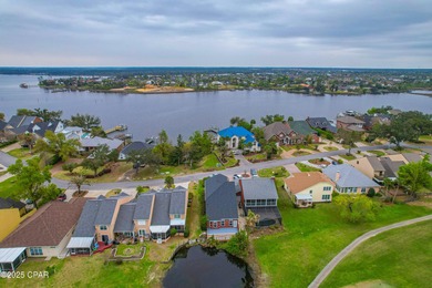 This spacious and stately 3 bedroom 2.5 bath townhome offers the on Panama Country Club in Florida - for sale on GolfHomes.com, golf home, golf lot