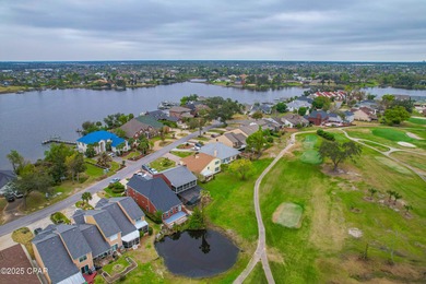 This spacious and stately 3 bedroom 2.5 bath townhome offers the on Panama Country Club in Florida - for sale on GolfHomes.com, golf home, golf lot