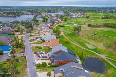 This spacious and stately 3 bedroom 2.5 bath townhome offers the on Panama Country Club in Florida - for sale on GolfHomes.com, golf home, golf lot
