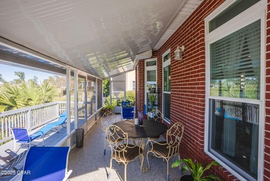 This spacious and stately 3 bedroom 2.5 bath townhome offers the on Panama Country Club in Florida - for sale on GolfHomes.com, golf home, golf lot