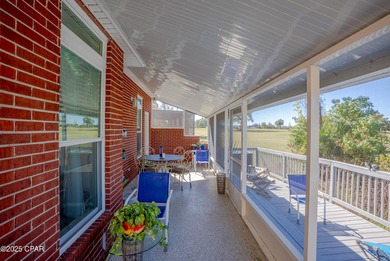 This spacious and stately 3 bedroom 2.5 bath townhome offers the on Panama Country Club in Florida - for sale on GolfHomes.com, golf home, golf lot