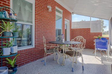 This spacious and stately 3 bedroom 2.5 bath townhome offers the on Panama Country Club in Florida - for sale on GolfHomes.com, golf home, golf lot