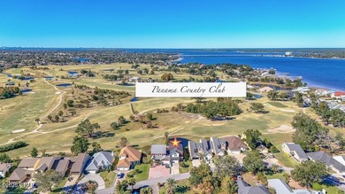 This spacious and stately 3 bedroom 2.5 bath townhome offers the on Panama Country Club in Florida - for sale on GolfHomes.com, golf home, golf lot