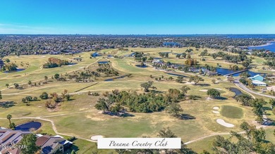 This spacious and stately 3 bedroom 2.5 bath townhome offers the on Panama Country Club in Florida - for sale on GolfHomes.com, golf home, golf lot