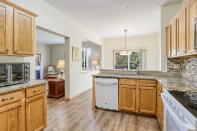 Ready for new owners, this refreshed Laguna RANCH model is on The Links at Carillon in Illinois - for sale on GolfHomes.com, golf home, golf lot