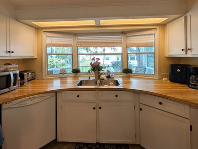 Modern Quality - Peace of Mind! Welcome to this 2 bedroom, 2 on Grasslands Golf and Country Club in Florida - for sale on GolfHomes.com, golf home, golf lot