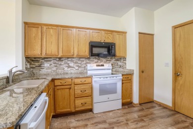 Ready for new owners, this refreshed Laguna RANCH model is on The Links at Carillon in Illinois - for sale on GolfHomes.com, golf home, golf lot