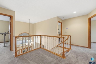 Beautiful two-story home located on the scenic Prairie Green on Prairie Green Golf Course in South Dakota - for sale on GolfHomes.com, golf home, golf lot