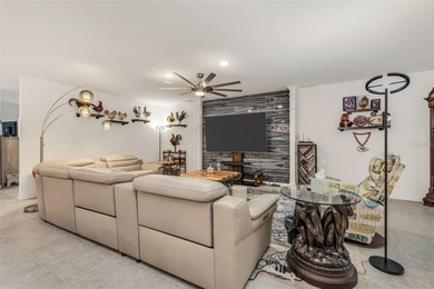 Feel right at home the moment you arrive at this bright and airy on Deep Creek Golf Club in Florida - for sale on GolfHomes.com, golf home, golf lot