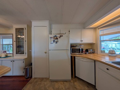 Modern Quality - Peace of Mind! Welcome to this 2 bedroom, 2 on Grasslands Golf and Country Club in Florida - for sale on GolfHomes.com, golf home, golf lot