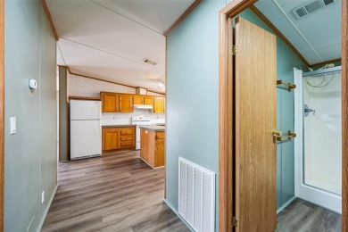 ** Port Charlotte Village was voted #1 manufactured home on Kings Gate Golf Club in Florida - for sale on GolfHomes.com, golf home, golf lot