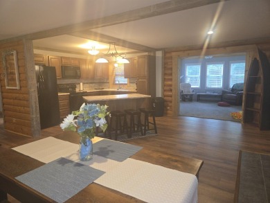 Gorgeous Log Cabin in highly desired location.  Deeded Access to on Northern Bay Golf Resort and Marina in Wisconsin - for sale on GolfHomes.com, golf home, golf lot