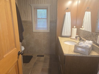 Gorgeous Log Cabin in highly desired location.  Deeded Access to on Northern Bay Golf Resort and Marina in Wisconsin - for sale on GolfHomes.com, golf home, golf lot
