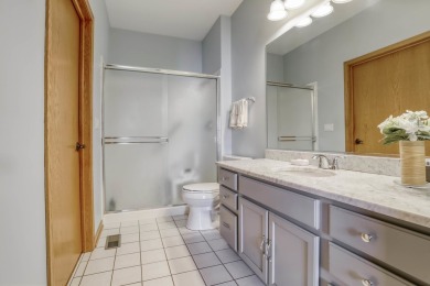 Ready for new owners, this refreshed Laguna RANCH model is on The Links at Carillon in Illinois - for sale on GolfHomes.com, golf home, golf lot