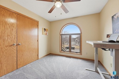 Beautiful two-story home located on the scenic Prairie Green on Prairie Green Golf Course in South Dakota - for sale on GolfHomes.com, golf home, golf lot