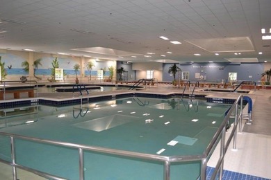 Live the Florida lifestyle in this 1st floor remodeled apartment on Addison Reserve in Florida - for sale on GolfHomes.com, golf home, golf lot