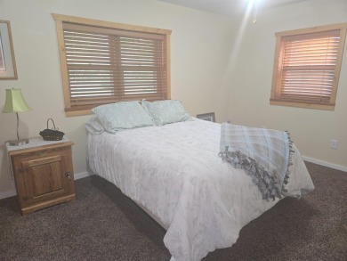 Gorgeous Log Cabin in highly desired location.  Deeded Access to on Northern Bay Golf Resort and Marina in Wisconsin - for sale on GolfHomes.com, golf home, golf lot