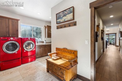 This stunning, uniquely Colorado, 5061 sq ft custom ranch home on The Golf Club At Bear Dance in Colorado - for sale on GolfHomes.com, golf home, golf lot