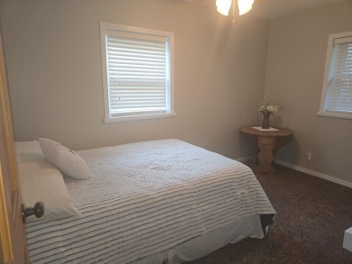 Gorgeous Log Cabin in highly desired location.  Deeded Access to on Northern Bay Golf Resort and Marina in Wisconsin - for sale on GolfHomes.com, golf home, golf lot