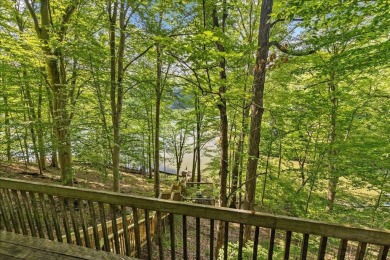 Charming Lakefront Cabin in Hideaway Hills Resort awaits you! on Hide-A-Way Hills Golf Club in Ohio - for sale on GolfHomes.com, golf home, golf lot