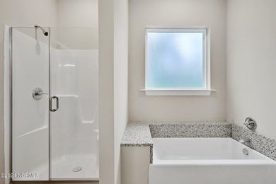 Welcome to your coastal haven, nestled among ancient oaks along on Lockwood Folly Country Club in North Carolina - for sale on GolfHomes.com, golf home, golf lot