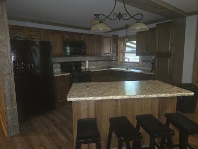 Gorgeous Log Cabin in highly desired location.  Deeded Access to on Northern Bay Golf Resort and Marina in Wisconsin - for sale on GolfHomes.com, golf home, golf lot