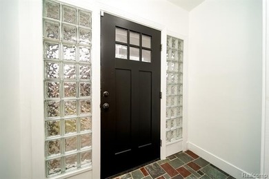 Stunning totally renovated classic center entrance brick on Detroit Golf Club  in Michigan - for sale on GolfHomes.com, golf home, golf lot