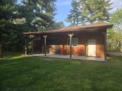 Gorgeous Log Cabin in highly desired location.  Deeded Access to on Northern Bay Golf Resort and Marina in Wisconsin - for sale on GolfHomes.com, golf home, golf lot