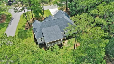 Welcome to your coastal haven, nestled among ancient oaks along on Lockwood Folly Country Club in North Carolina - for sale on GolfHomes.com, golf home, golf lot