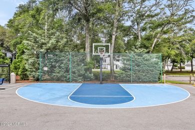 Welcome to your coastal haven, nestled among ancient oaks along on Lockwood Folly Country Club in North Carolina - for sale on GolfHomes.com, golf home, golf lot