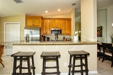 Unique top-floor condo with expansive golf views. This Dogwood on Heritage Palms Golf and Country Club in Florida - for sale on GolfHomes.com, golf home, golf lot
