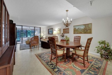 Discover the perfect blend of comfort and convenience in this on The Country Club At Boca Raton in Florida - for sale on GolfHomes.com, golf home, golf lot