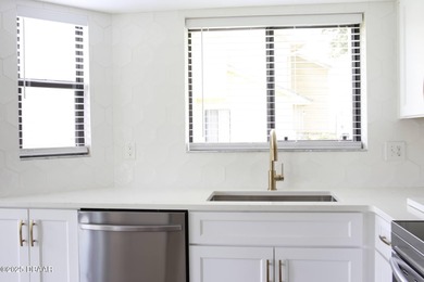 COMPLETELY RENOVATED Gated Golf Cmty - 3BR/2BA END UNIT | 128-B on The Club At Pelican Bay - North Course in Florida - for sale on GolfHomes.com, golf home, golf lot