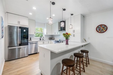 Don't miss out on a rare opportunity to own this GROUND FLOOR on Tarpon Woods Golf Club in Florida - for sale on GolfHomes.com, golf home, golf lot