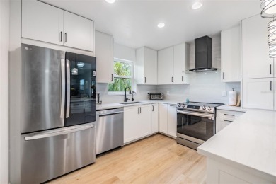 Don't miss out on a rare opportunity to own this GROUND FLOOR on Tarpon Woods Golf Club in Florida - for sale on GolfHomes.com, golf home, golf lot