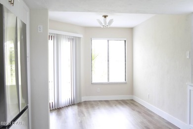 COMPLETELY RENOVATED Gated Golf Cmty - 3BR/2BA END UNIT | 128-B on The Club At Pelican Bay - North Course in Florida - for sale on GolfHomes.com, golf home, golf lot